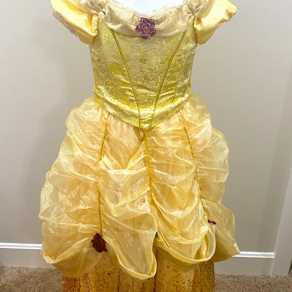 A Belle dress with the rose symbol on the front, in great condition.